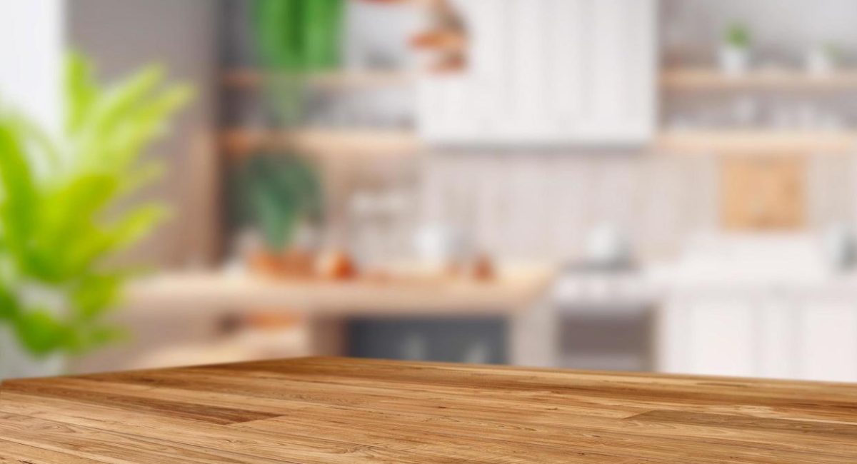 wood-table-top-on-blurred-kitchen-background-free-photo